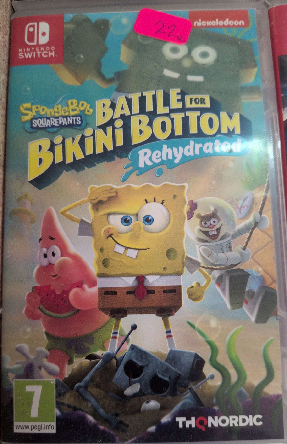 Photographed front cover and case of SpongeBob SquarePants: Battle for Bikini Bottom – Rehydrated for Nintendo Switch