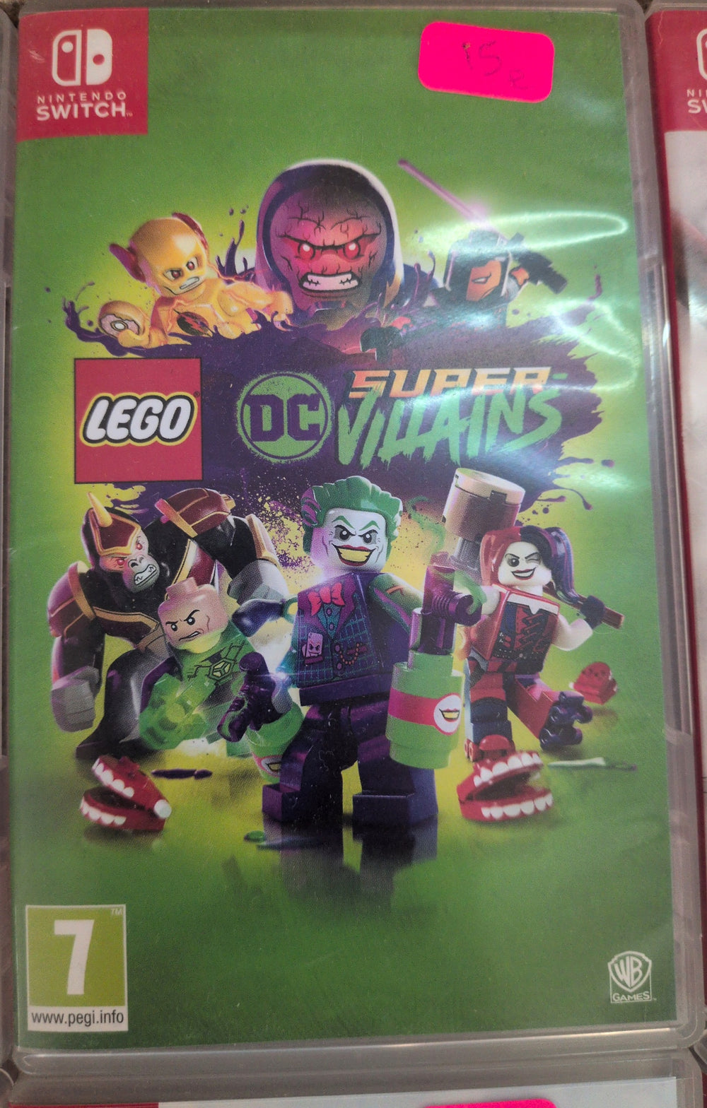 Photographed front cover and case of LEGO DC Super-Villains for Nintendo Switch