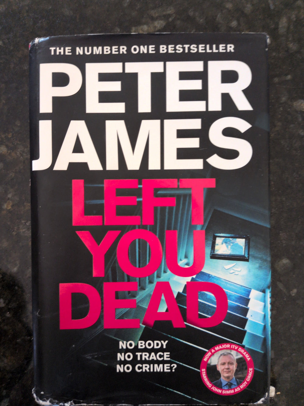 Actual photographed front cover of Left You Dead by Peter James