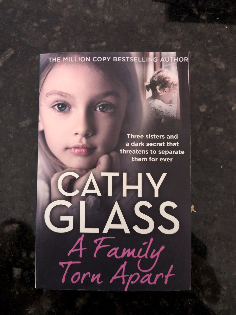 Actual photographed front cover of A Family Torn Apart by Cathy Glass