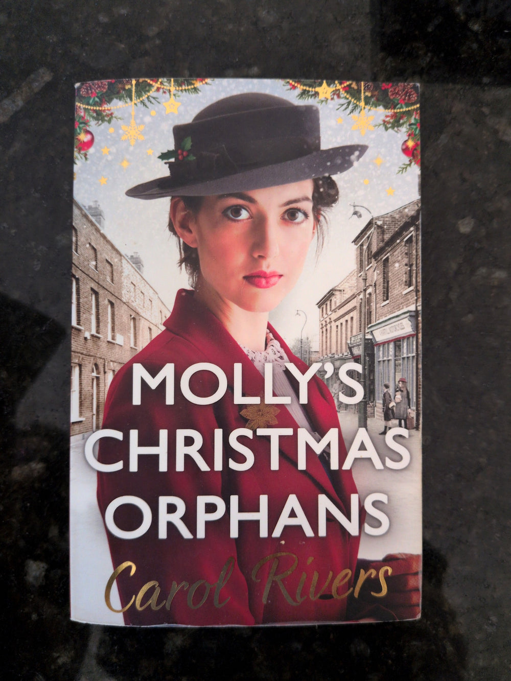 Actual photographed front cover of Molly’s Christmas Orphans by Carol Rivers