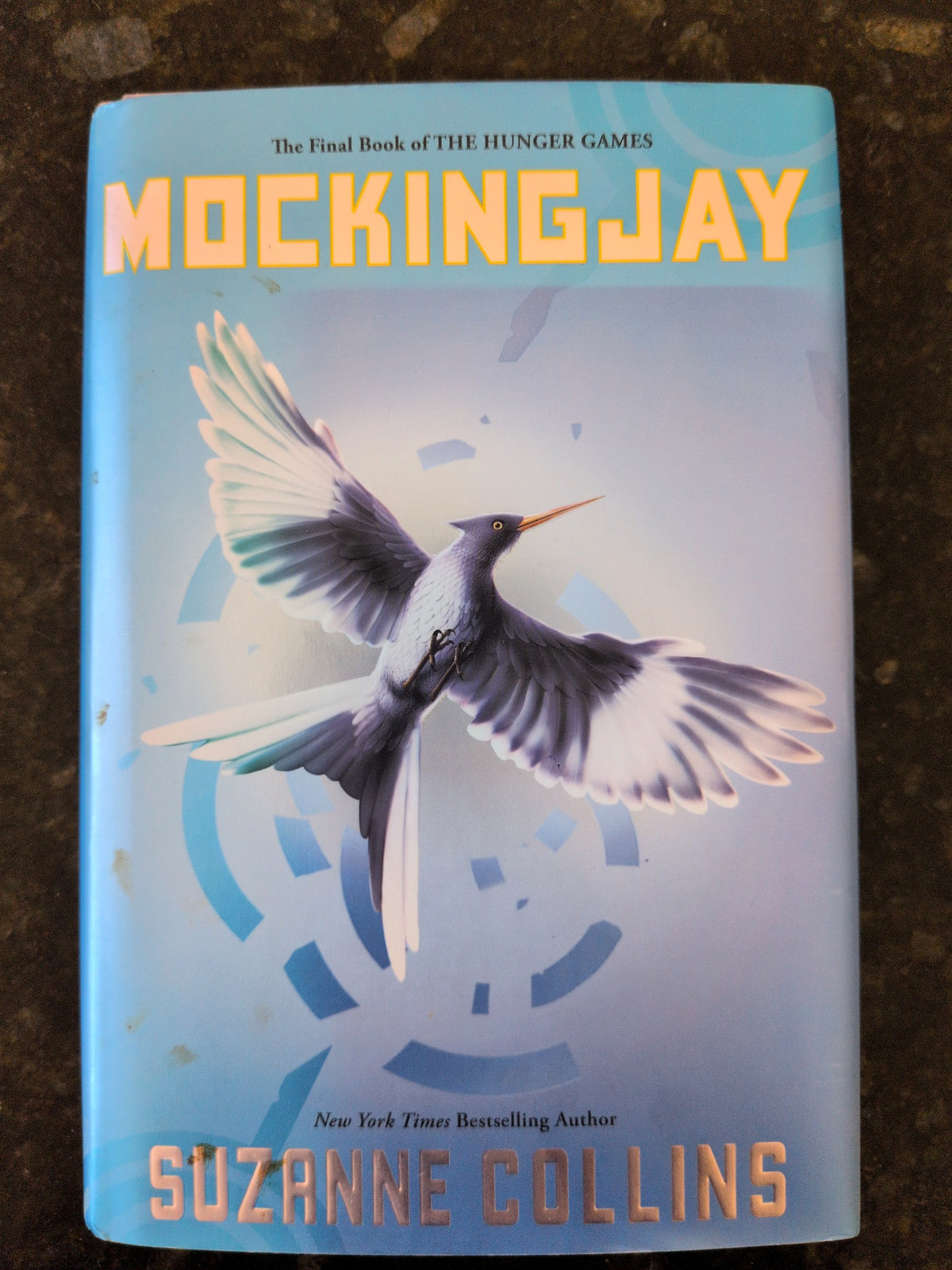 Actual photographed front cover of Mockingjay by Suzanne Collins