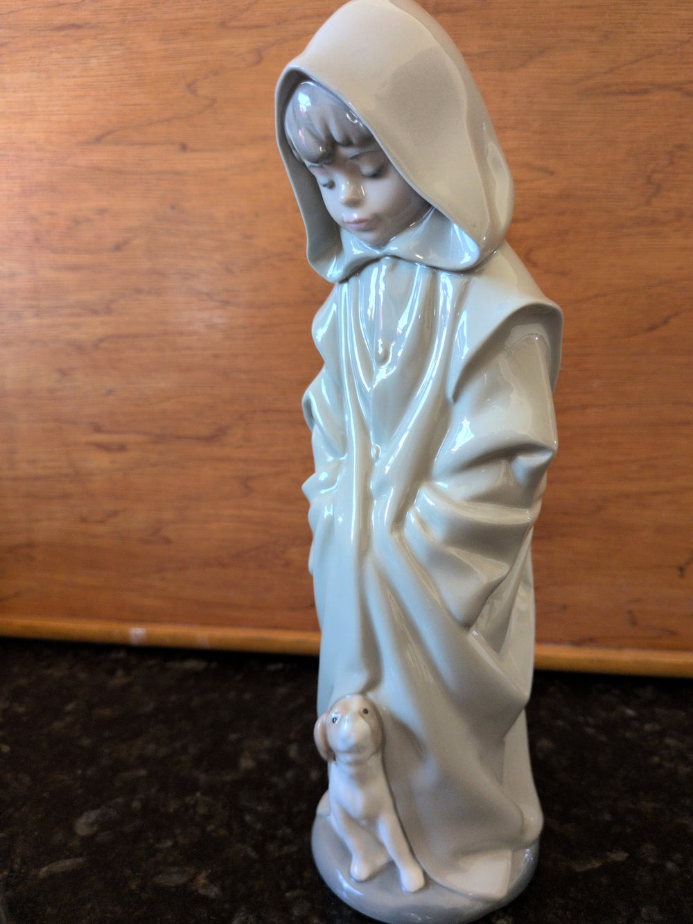 Actual photographed item: NAO Hooded Child with Dog Figurine