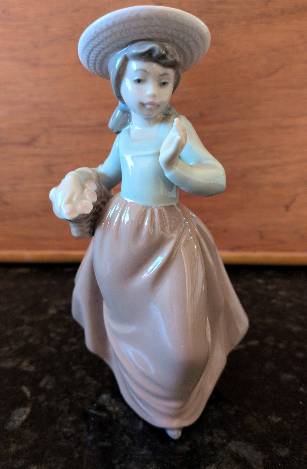 Actual photographed item: NAO Girl with Flower Basket Figurine