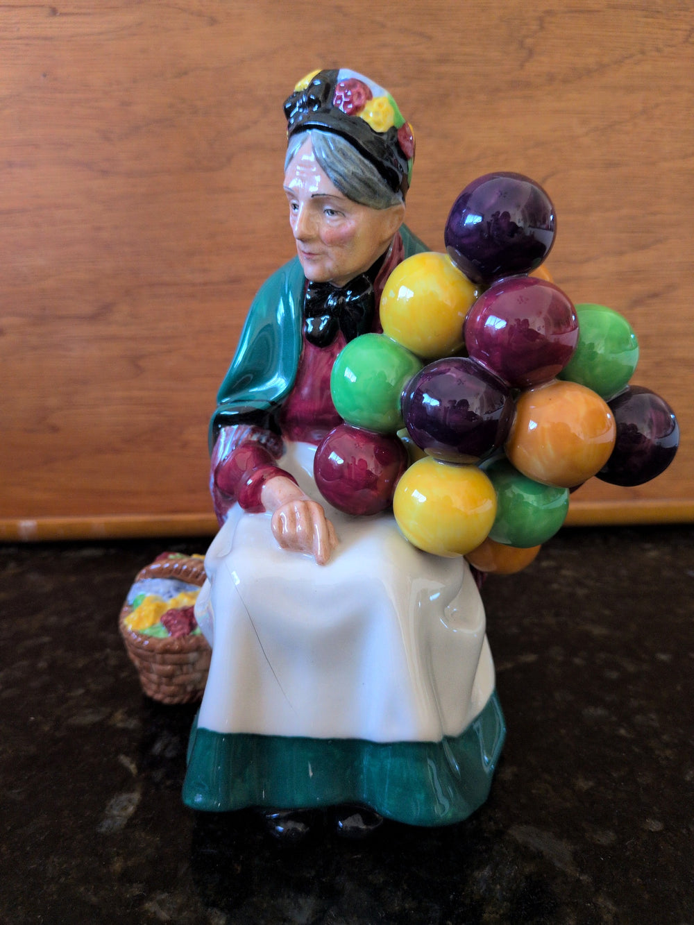 Actual photographed item: Royal Doulton The Old Balloon Seller Figurine