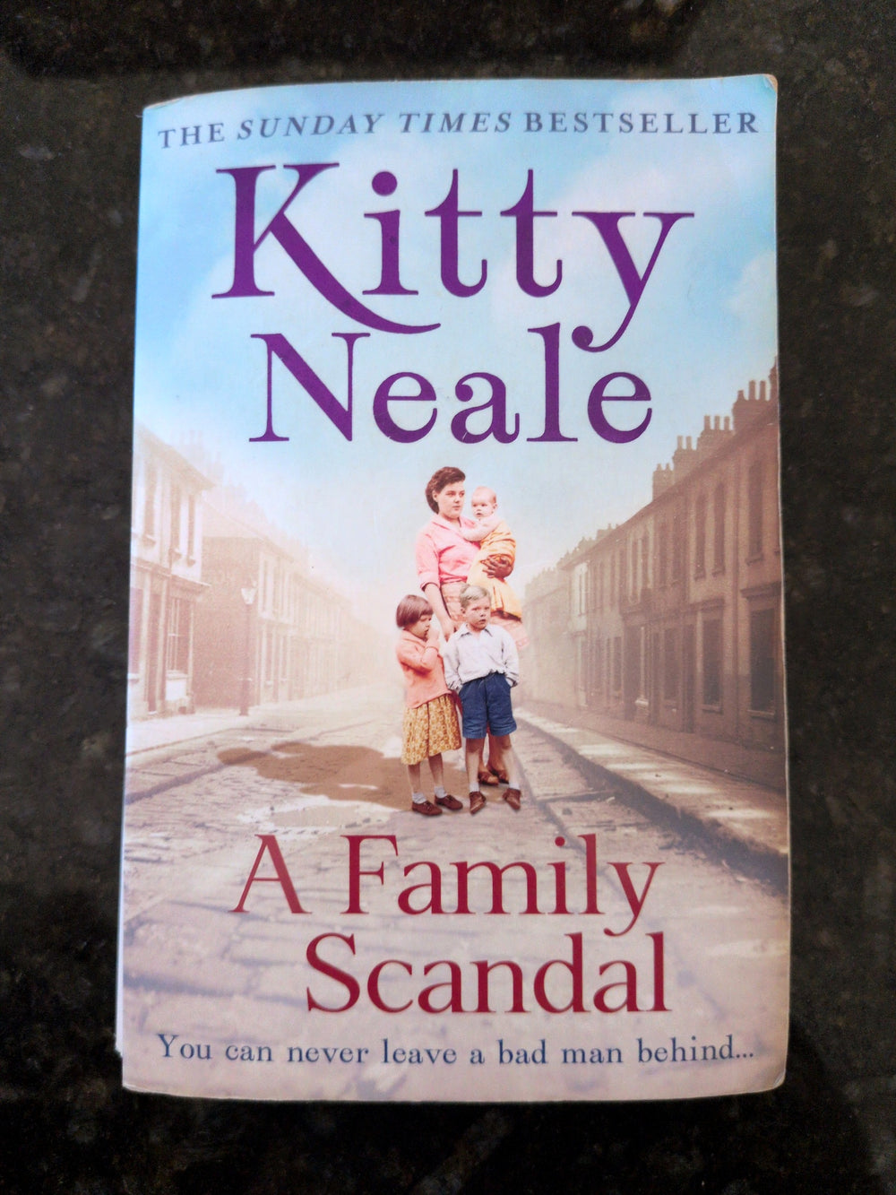Actual photographed item: A Family Scandal — Kitty Neale