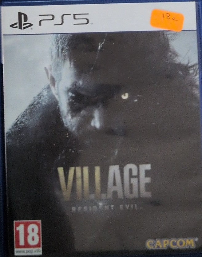 Photographed front cover and case of Resident Evil Village for PS5