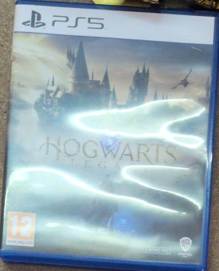 Photographed front cover and case of Hogwarts Legacy for PS5
