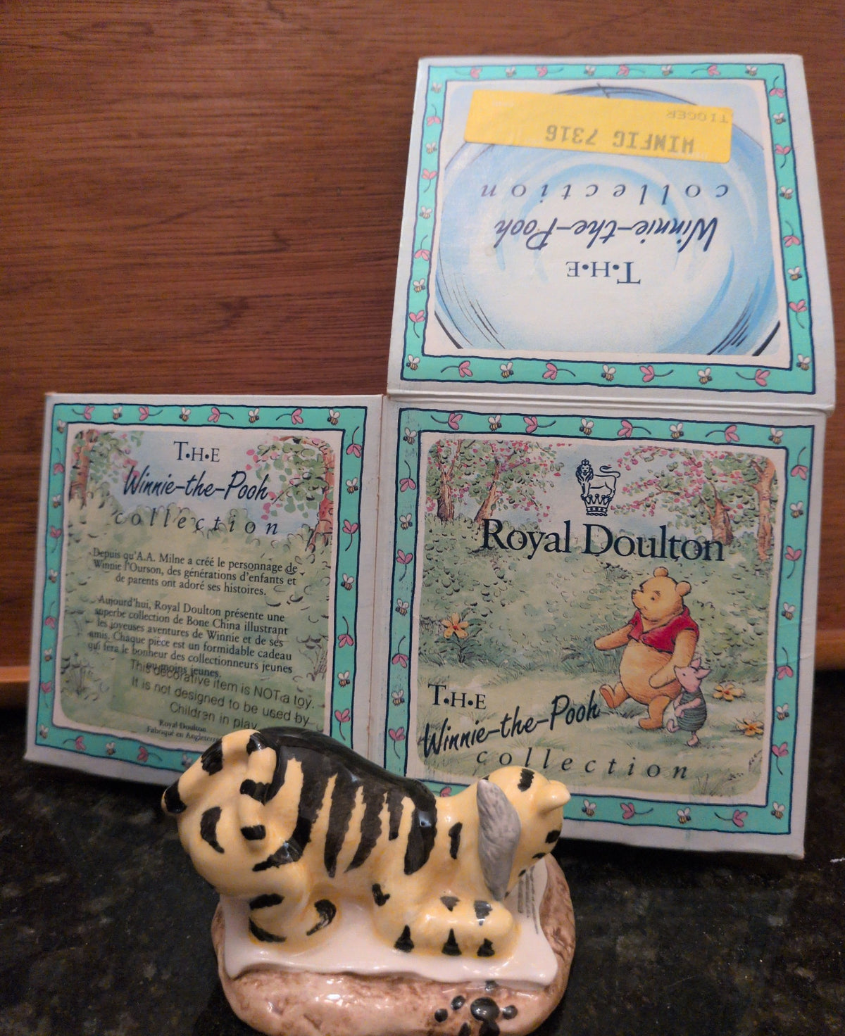 Actual photographed item: Royal Doulton Winnie the Pooh Tigger Signs the Rissolution Figurine (Boxed)