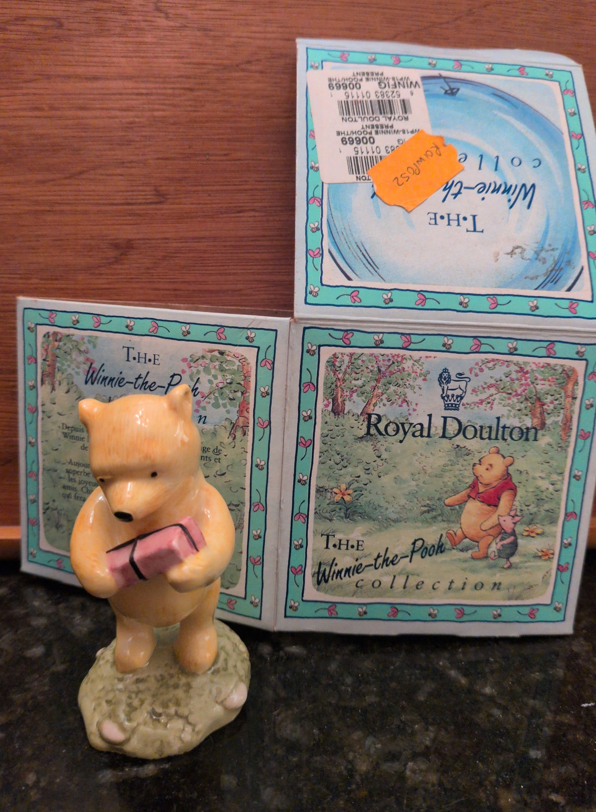 Actual photographed item: Royal Doulton Winnie the Pooh and the Present Figurine (Boxed)