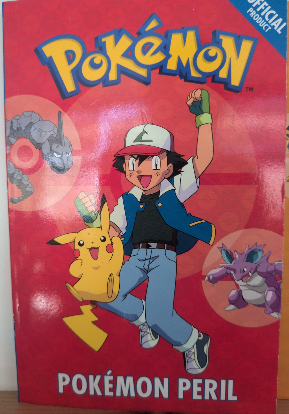 Photographed front cover of Pokémon: Pokémon Peril, paperback