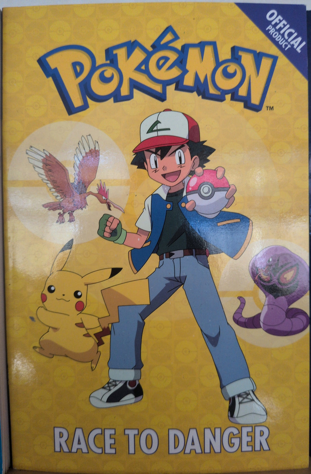 Photographed front cover of Pokémon: Race to Danger, paperback