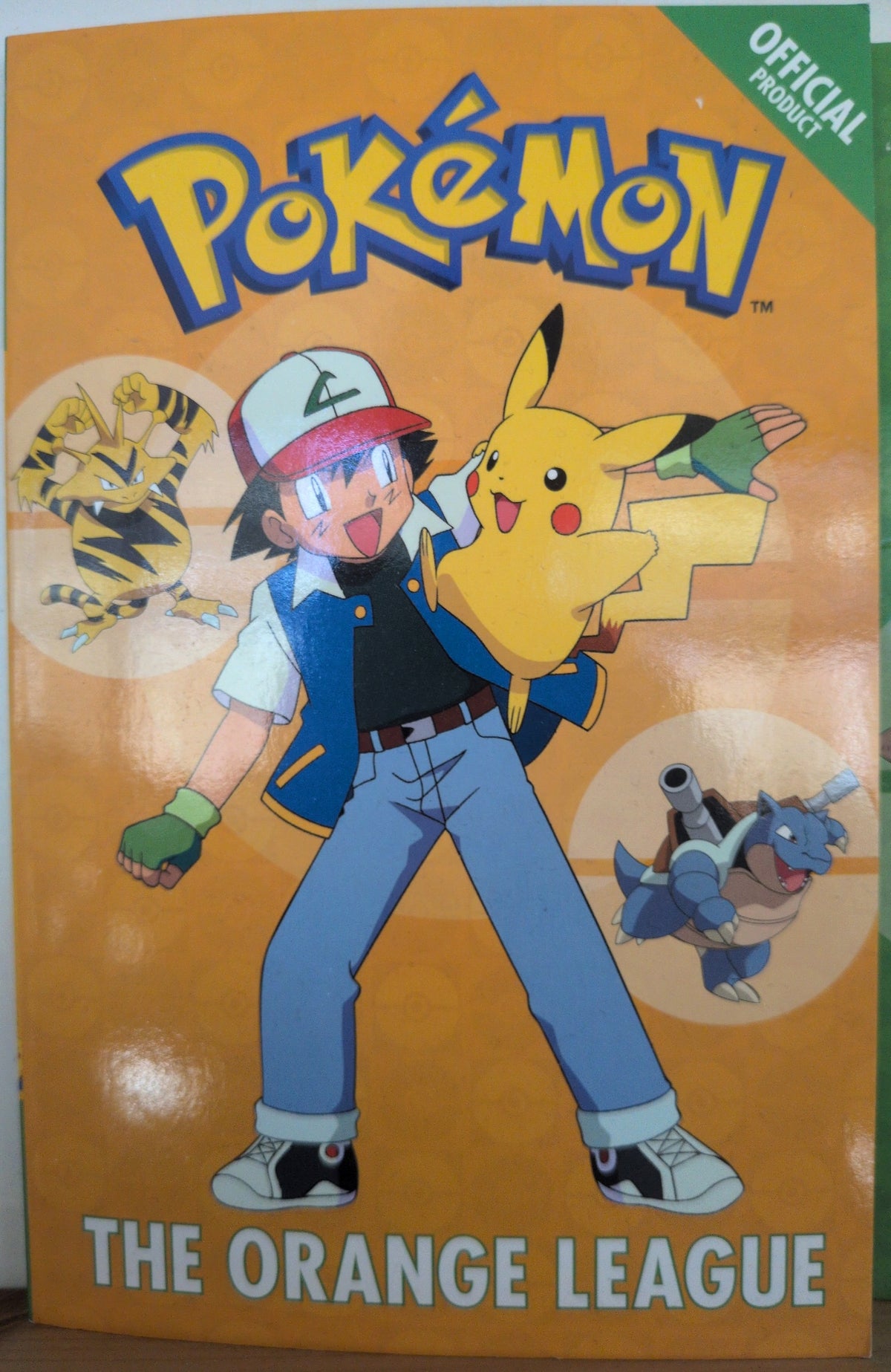 Photographed front cover of Pokémon: The Orange League, paperback