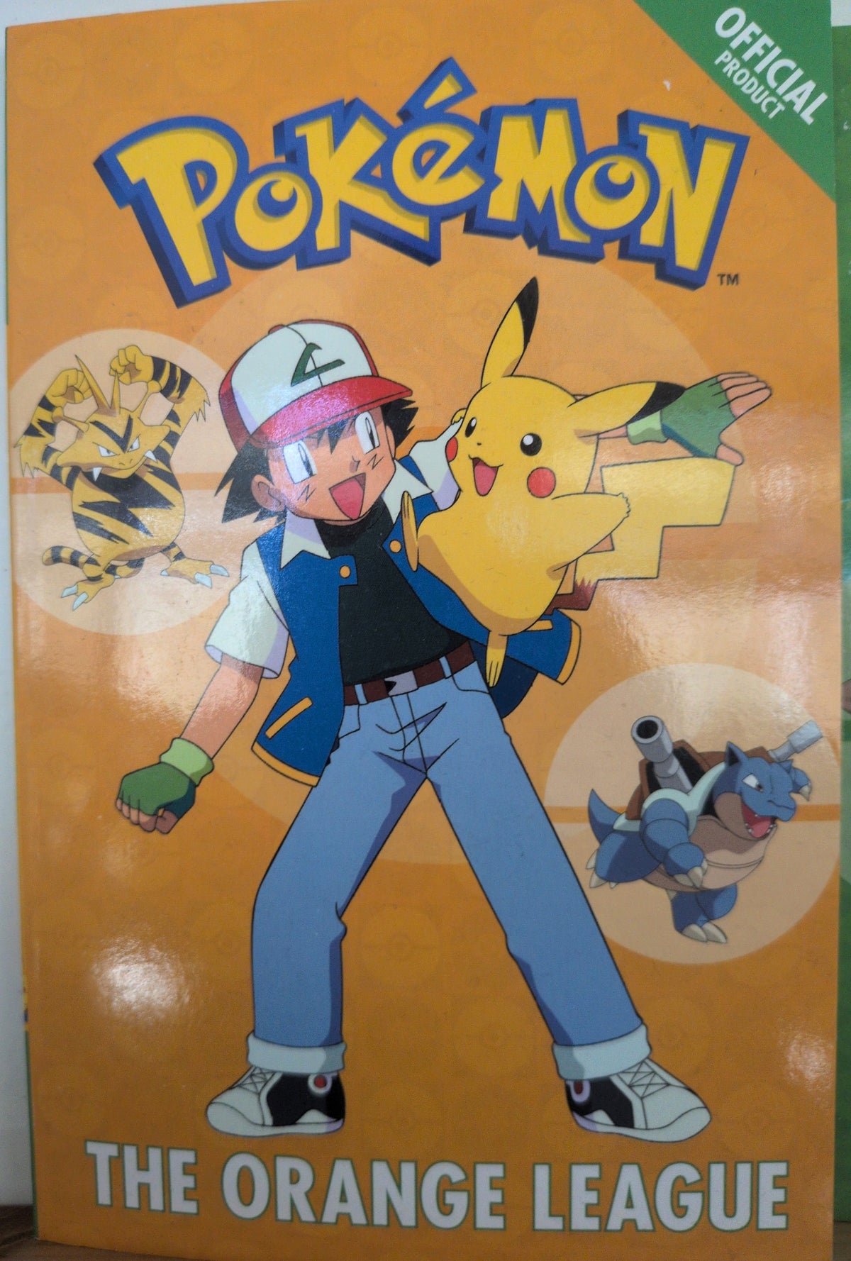 Photographed front cover of Pokémon: The Orange League, paperback — second photograph