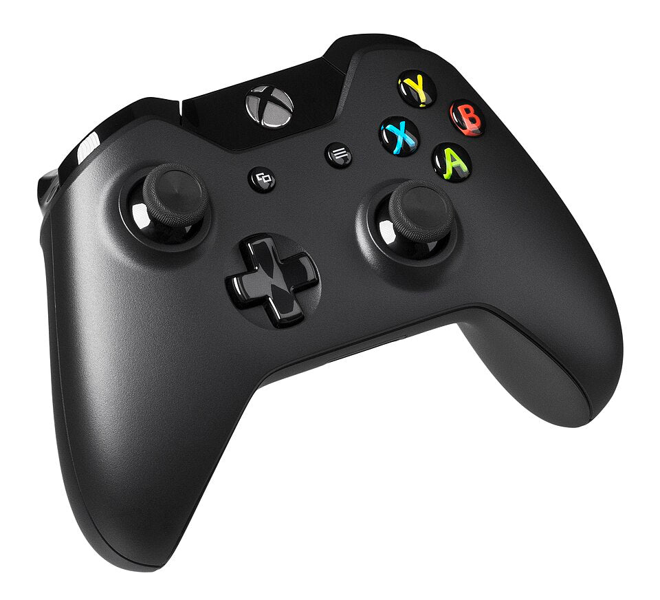 A black game controller on white